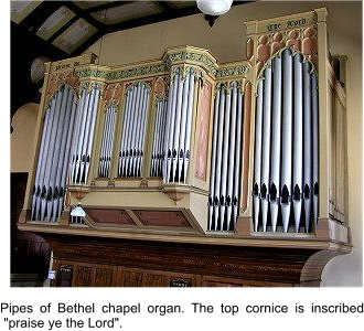 Pipes of Bethel chapel organ. The top cornice is inscribed  "praise ye the Lord".
